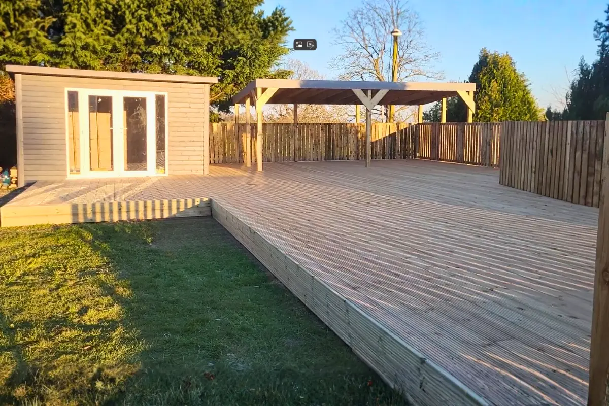 Decking area with fencing and a pergola
